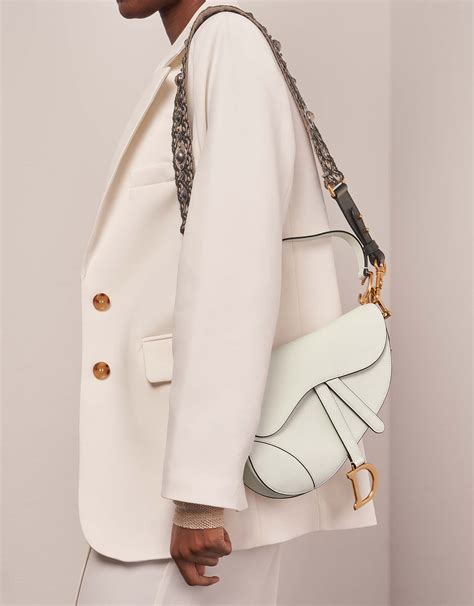 nude dior saddle bag|Dior saddle bag on model.